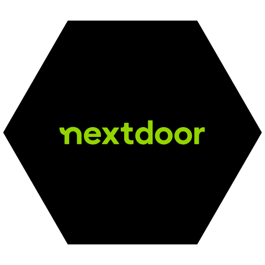 Nextdoor logo in green text on a black hexagonal background.